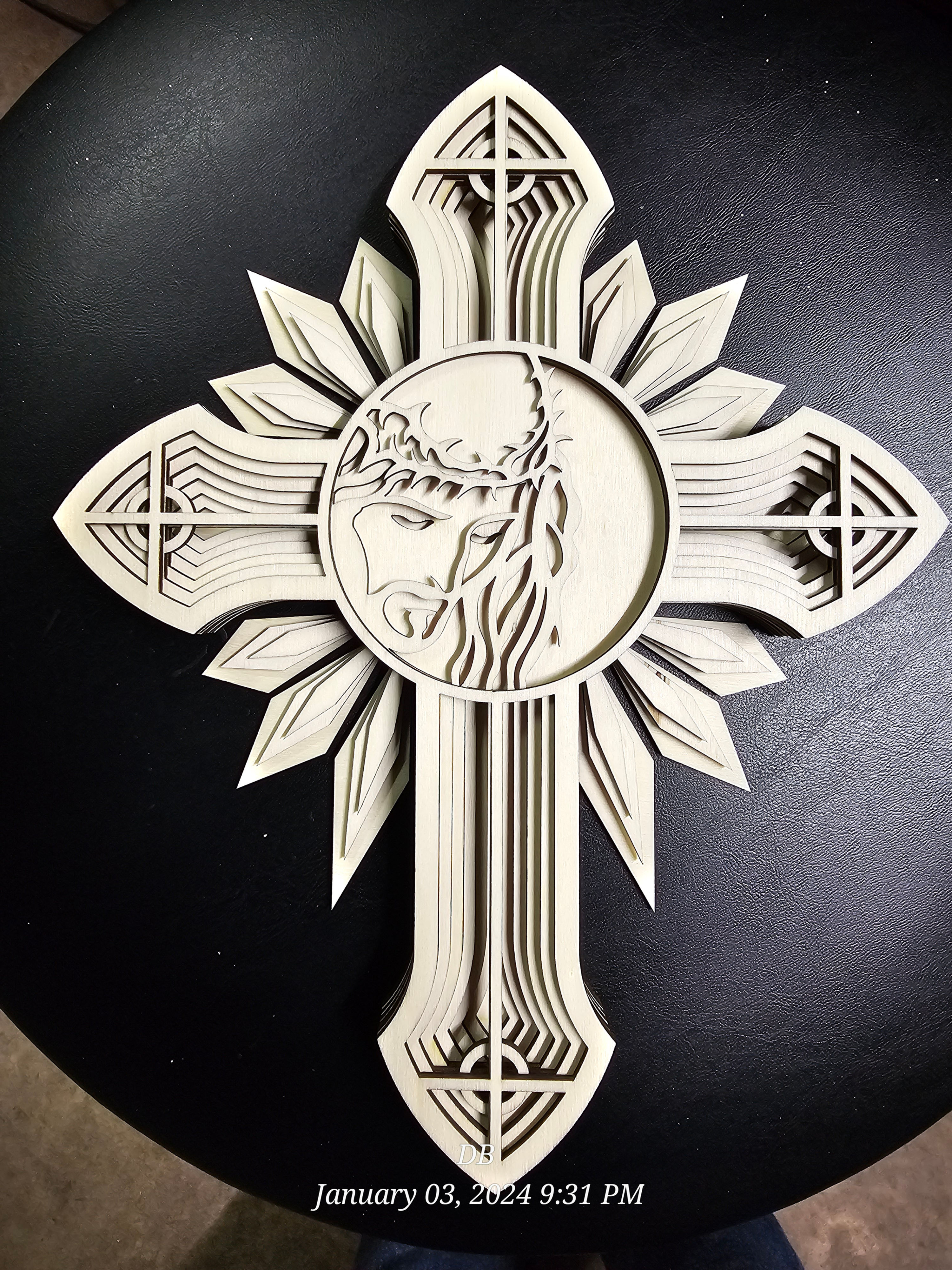 Laser cut Jesus on 8 layered laser cut cross, Bennett's Wood Works design.