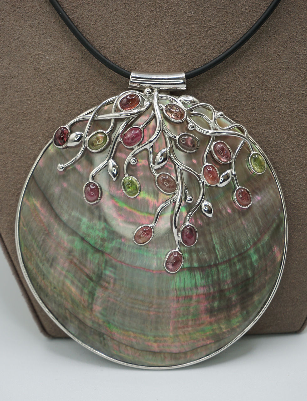 Thumbnail: Multi Color Gemstone and Black Mother of Pearl Pendant with a Leather Cord