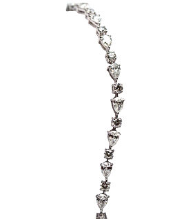 18k White Gold Fancy Tennis Bracelet featuring 7.16ct of Round and Pear Shaped Diamonds
Ref# 171-17260 - Call for pricing