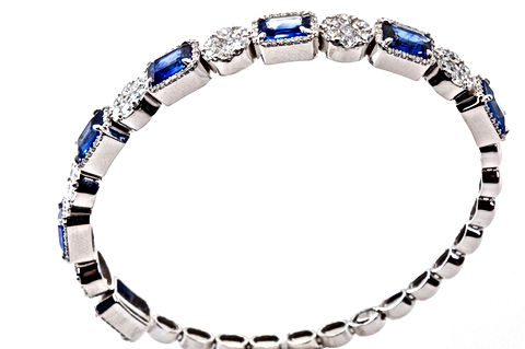 18k White Gold Flexi Style Bangle Bracelet with round diamonds and emerald cut royal blue sapphires