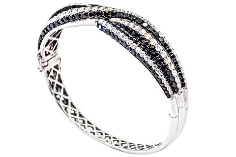 18k White Gold Twist Bangle Bracelet with 7.30 carats of black diamonds and 4.36 carats of diamonds