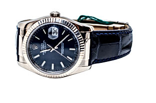 18K White Gold Rolex Datejust with a royal blue dial on a navy leather band