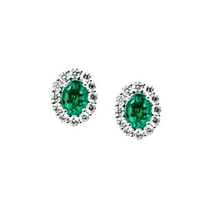 18k White Gold Emerald (1.49 carats) and .80 carats of Diamonds earrings.