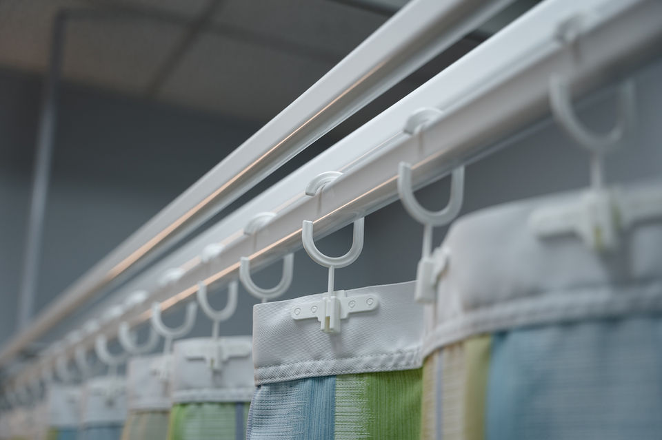 Hospital curtain track system mounted on the ceiling