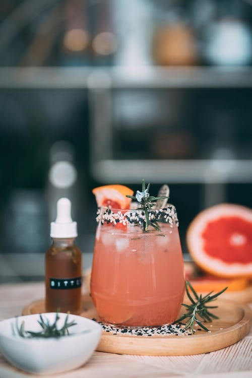 Fresh,Delicious and Nutritious Grapefruit Juice served in a glass, with grapefruit slice around.