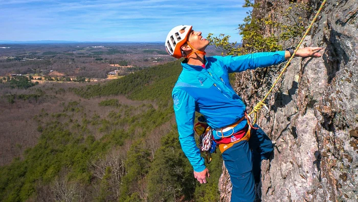 A climber on a rock face in Gaston County, from the Phase Up project archive