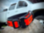 Thumbnail: 1.5" wide tactical dog collar in orange and black in front of truck