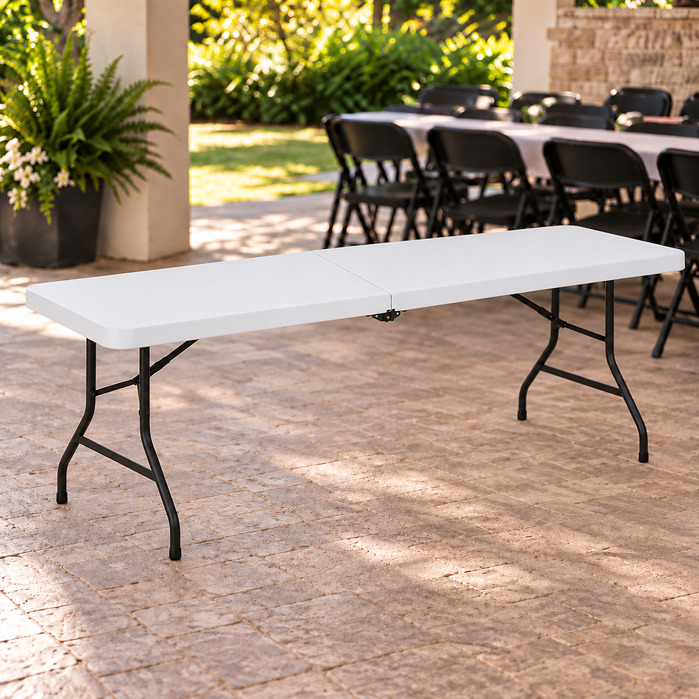 White 8ft bi-fold rectangular table rental with a visible center seam and black folding legs in an outdoor event setting