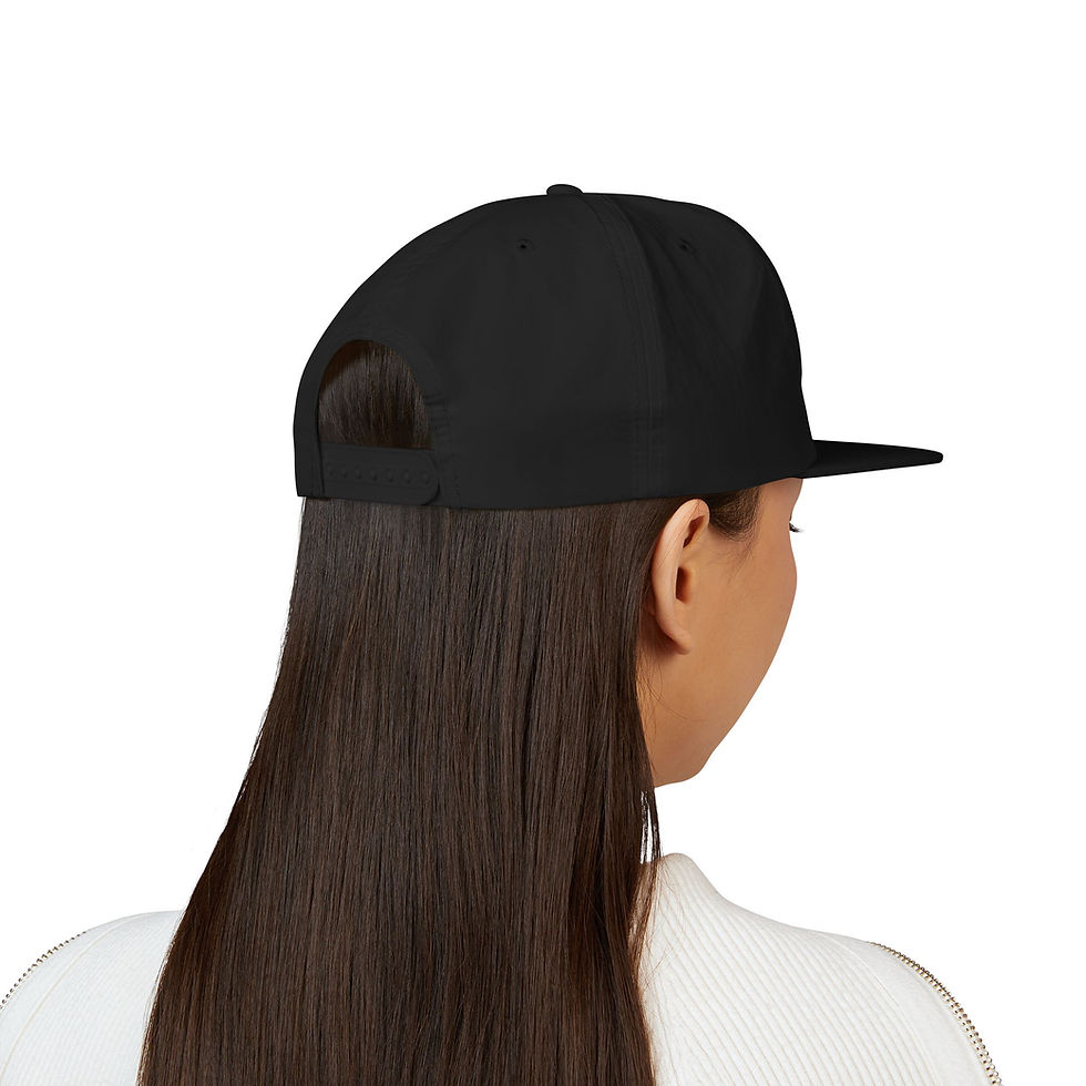 Thumbnail: Woman wearing black cap, with dark brown hair against a white background.