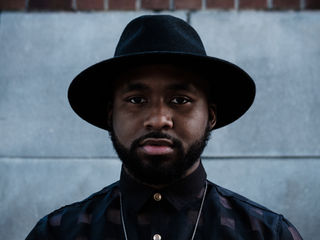 A portrait of a man with a hat