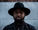 A portrait of a man with a hat