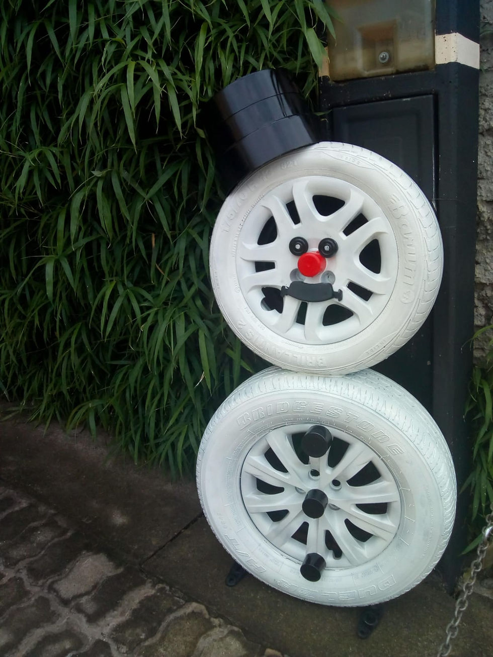 Snowman made from white tires.