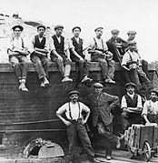 Brick workers in front of the old kiln