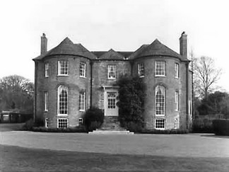 Black and white photo of Holywell House