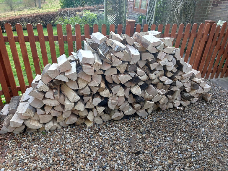Loose hardwood logs delivered by R Lambeth Landscape Southampton