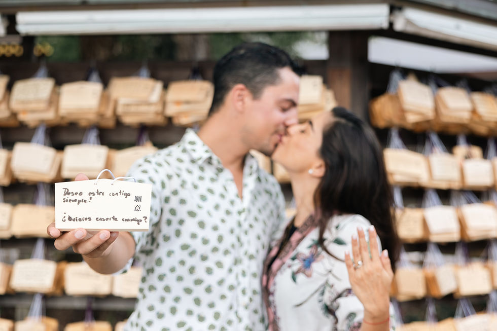 Surprise proposal at Meiji Jingu Shrine in Tokyo with traditional torii gates and forest atmosphere