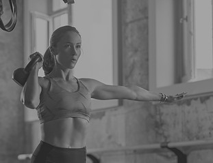 beautiful-female-athlete-exercising-in-fitness-clu-2023-04-18-19-07-34-utc_edited.jpg