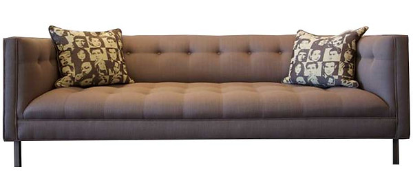 This is the Vanessa Sofa. It has fixed seats and backs with square button tufts.