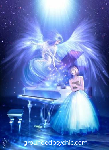 Mystical angel plays a grand piano in a starry space setting, while a woman in a blue dress stands beside. ethereal glow and "groundedpsychic.com" text visible.