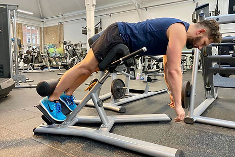Julien Bertherat performing a legs exercise combo.