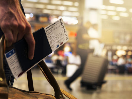 reviewing travel insurance policy before holiday