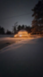 Illuminated geodome project showcase in a snowy landscape