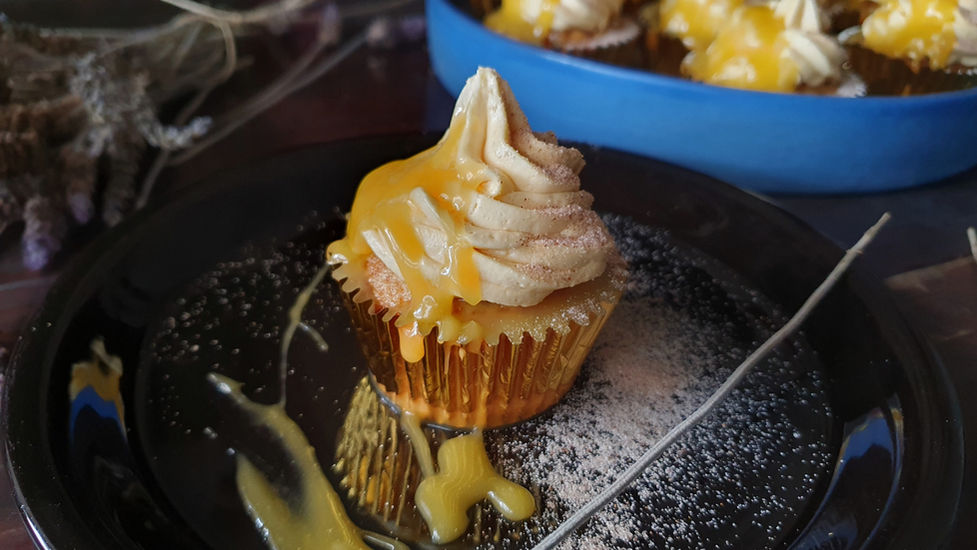 Beautiful food photography of a cupcake with caramel sauce