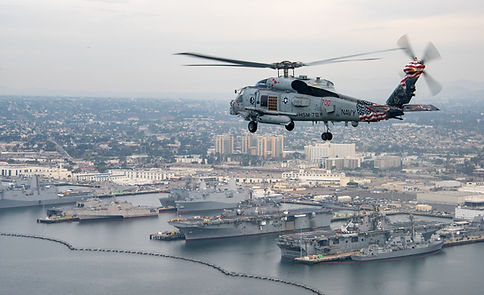 An_MH-60R_Sea_Hawk_helicopter_flies_over_San_Diego._(24546100368).jpg