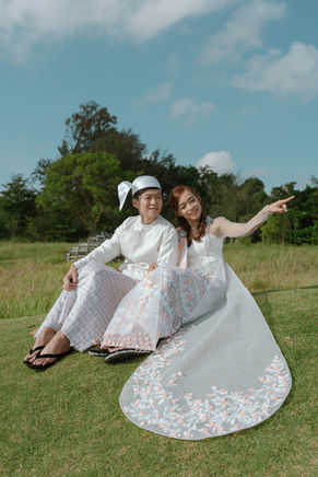 outdoor pre-wedding couple photography in burmese traditional outfits at jurong lake gardens singapore