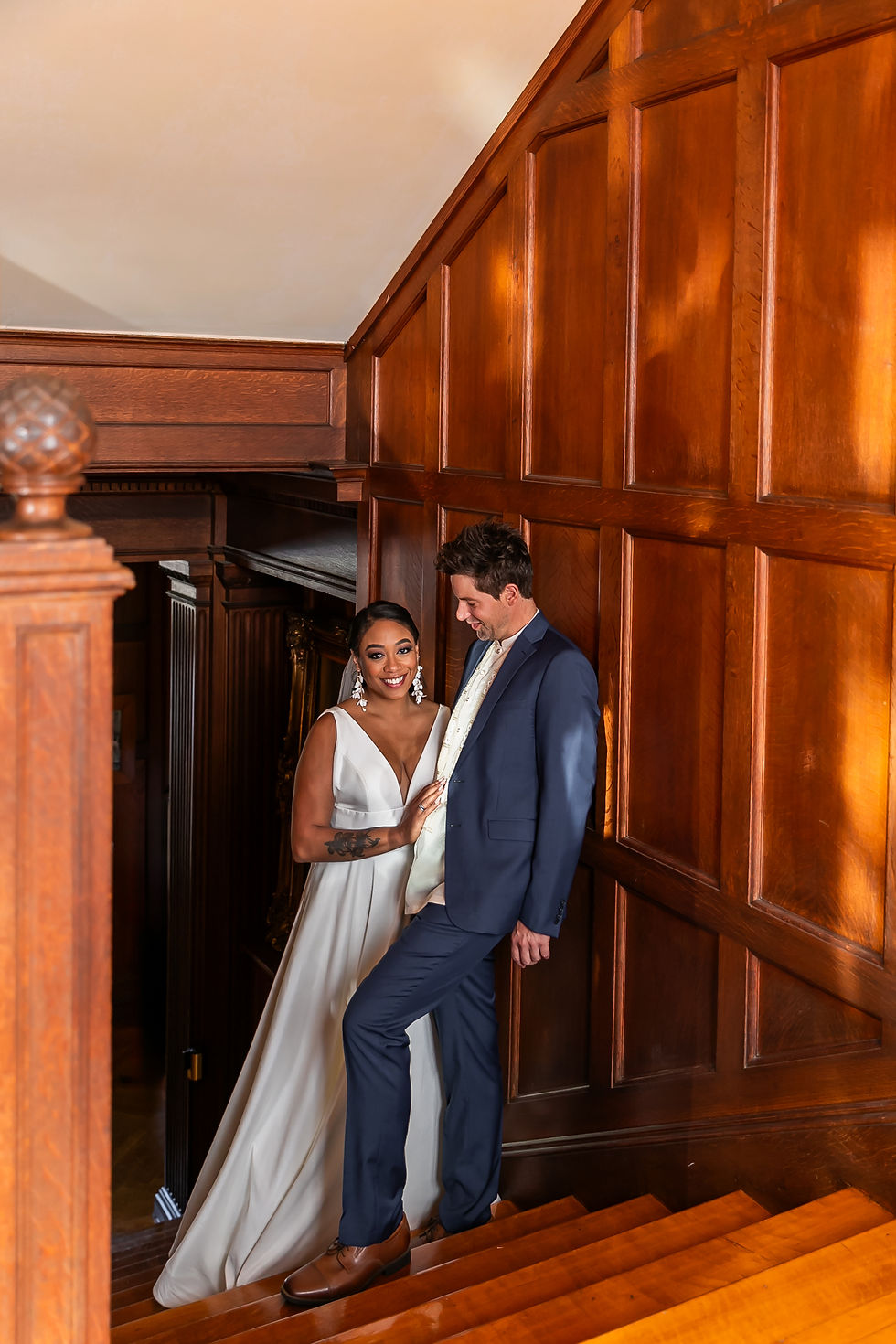 Bride & Groom Portraits on the grand staircase at Rutherford Hall