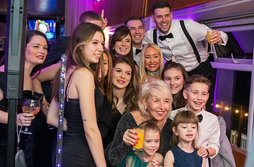 Disctilldawn Events group photo in front of magic selfie mirror at a party