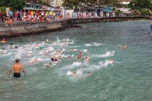 The boys experienced their first mass swim start. Notice all of the people spectating along the water's edge.