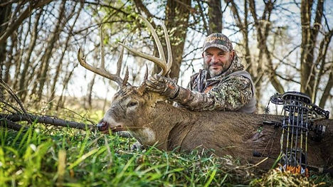 Kenneth Lancaster with Trophy Buck.jpeg