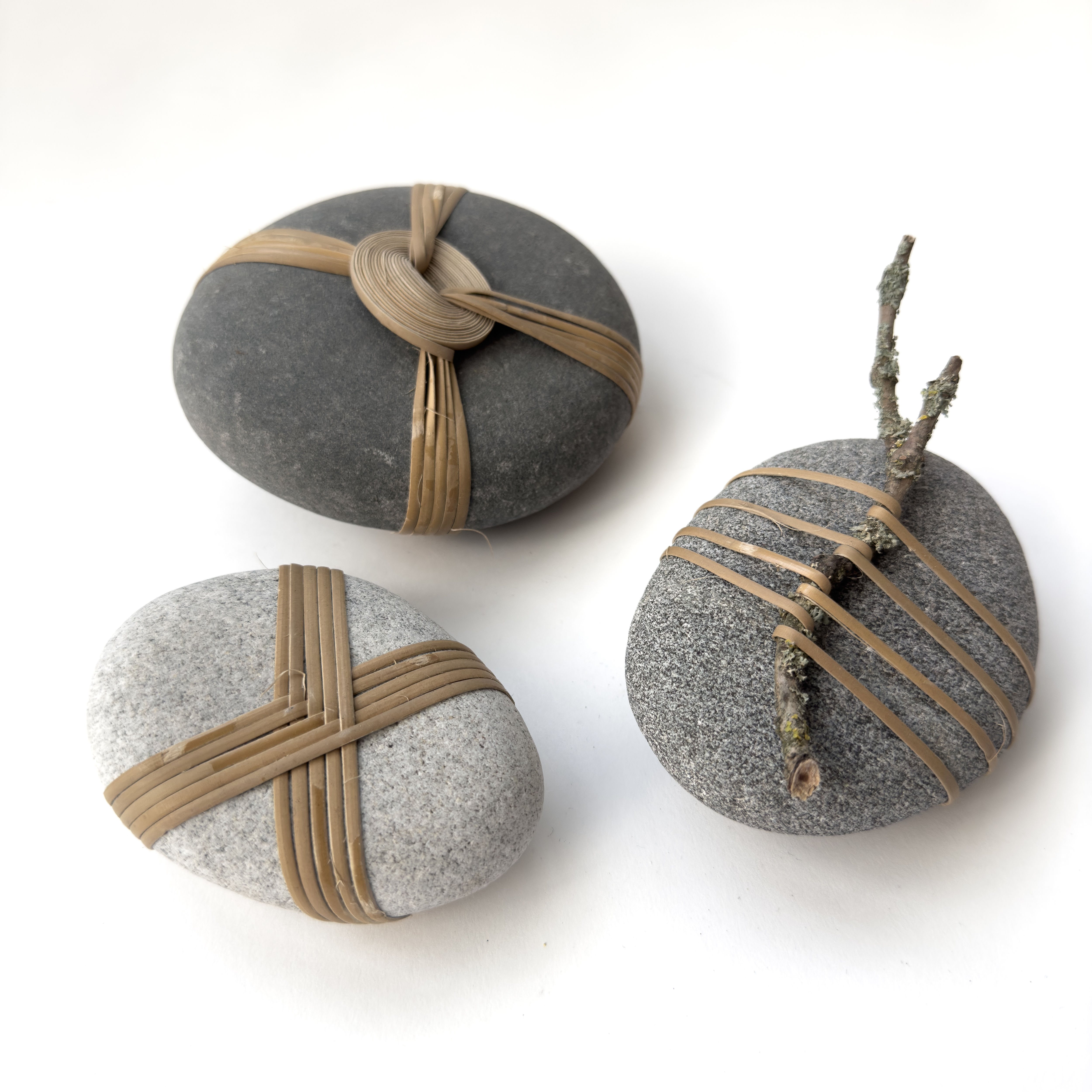 Riverstone wrapped with rotan
