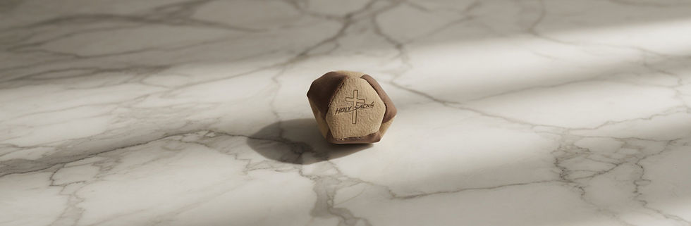 Brown hacky sack on a marble surface