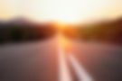diminishing-perspective-road-amidst-mountains-against-sky-sunset.jpg