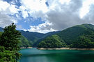 scenic-view-lake-against-cloudy-sky.jpg