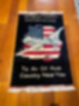 Handwoven drone rug with intricate designs depicting modern warfare and technology.