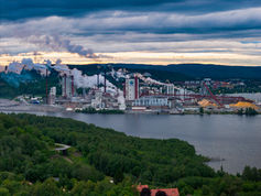 Wood processing plant by the fjord – industrial drone photo