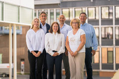 Group photo of employees outdoors – corporate photography