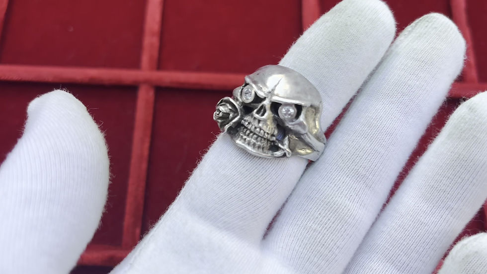 Thumbnail: 103164  |  UNCERTAIN. Skull & Rose silver Ring.