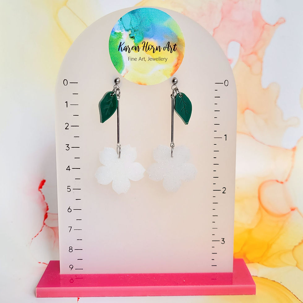 Thumbnail: Handmade white blossom flower resin earrings