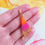 Thumbnail: Handmade triangle resin earrings, pink, orange and gold leaf, gold plated hook