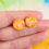 Thumbnail: Handmade orange and glitter resin and stainless steel stud
