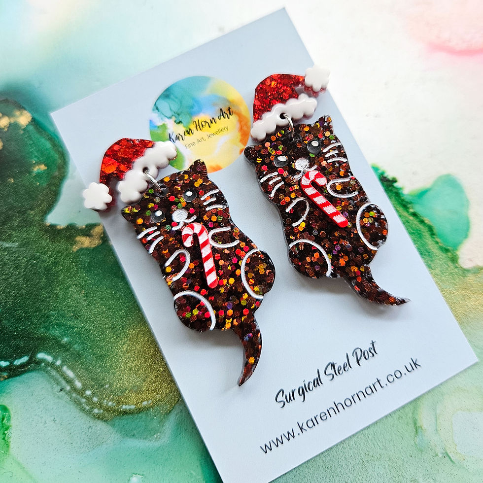 Thumbnail: Handmade Otters And Candy Canes Christmas Earrings