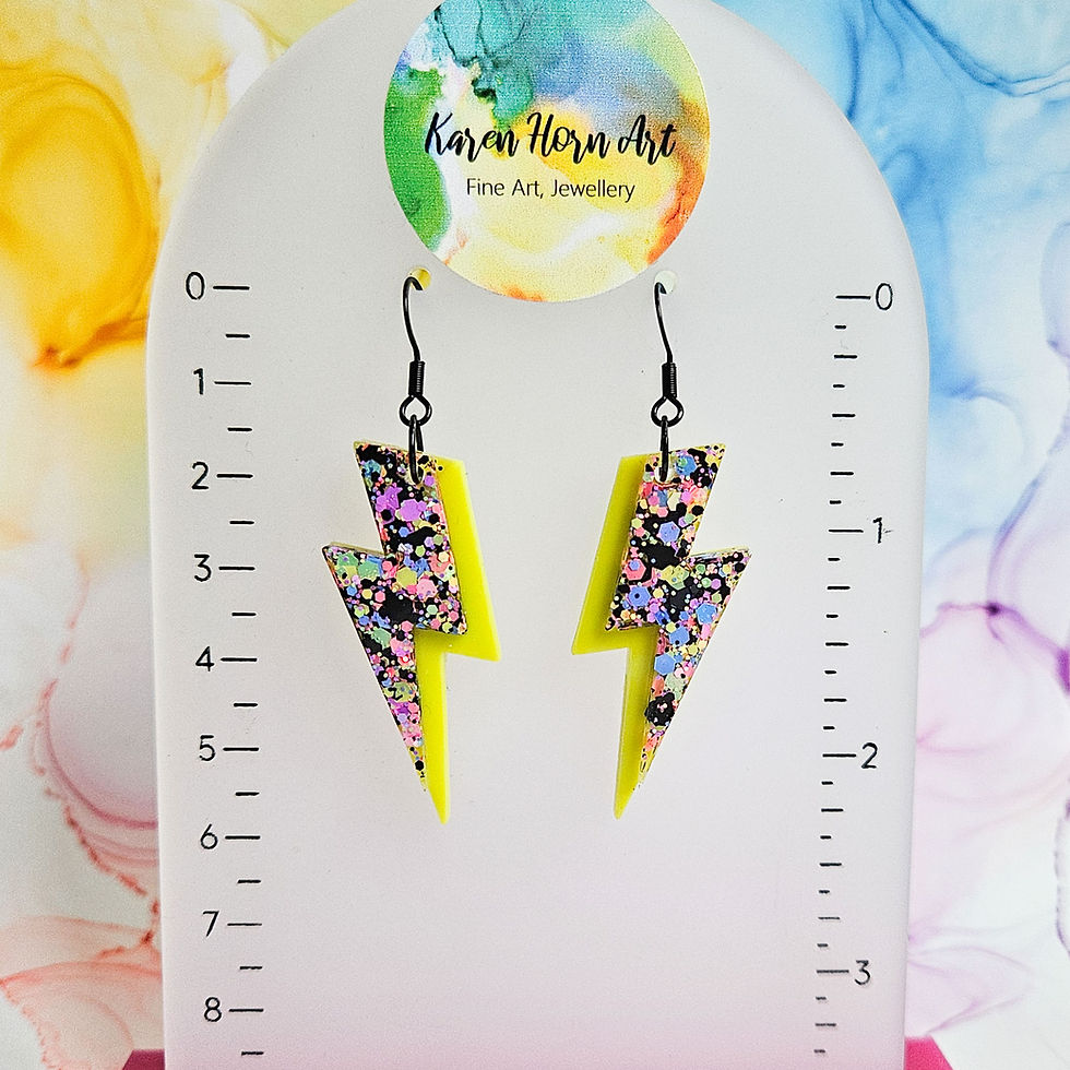Thumbnail: Handmade Glitter And Lime Bolt Resin Earrings