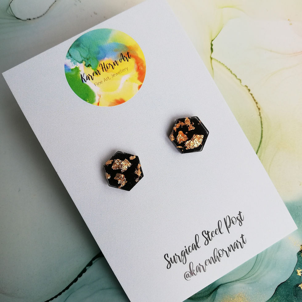 Thumbnail: Handmade hexagon resin stud earrings, black and encased gold leaf