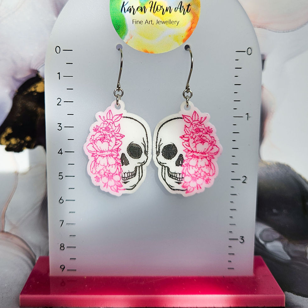 Thumbnail: Handmade white skull and pink flowers resin earrings