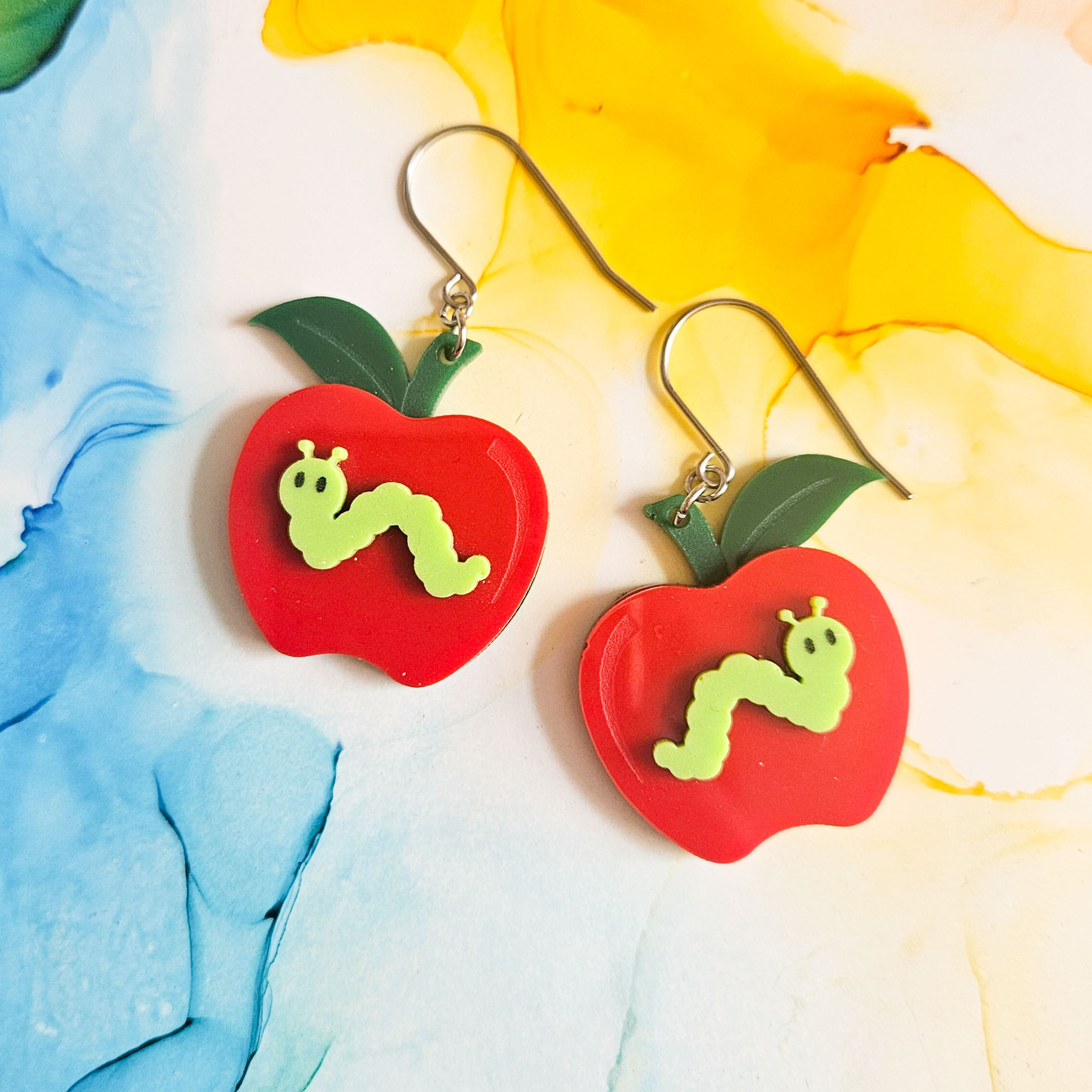 Handmade red apples and worms whimsical resin dangle earrings with surgical steel hooks