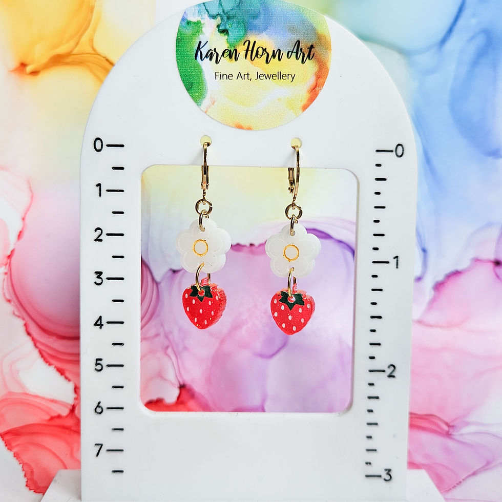 Thumbnail: Handmade strawberry and daisy resin charms on stainless steel huggie hoops